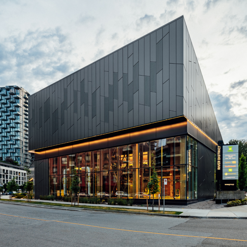River District energy centre with patterned exterior and visible interior equipment