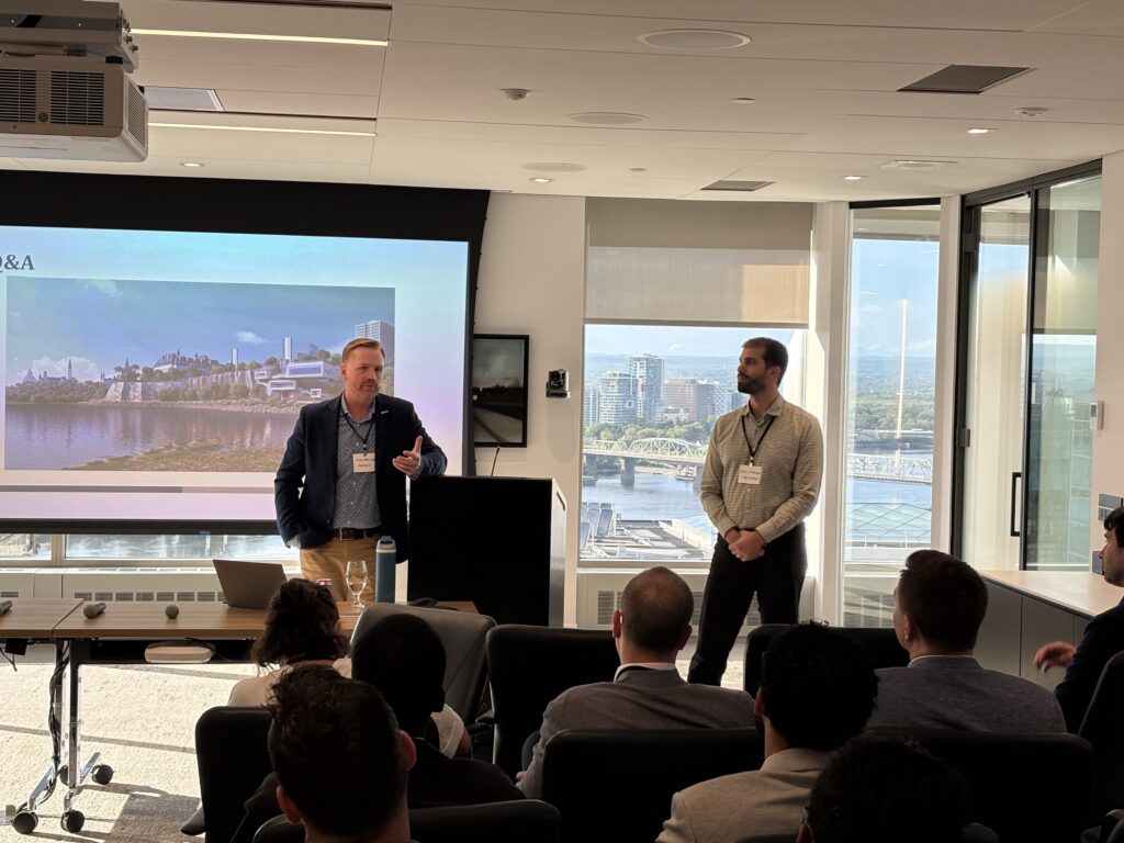Emil Haddad of FVB Energy and Sean Russell of Equans presenting on district energy and the Energy Services Acquisition Program at a Young Leaders in Infrastructure Ottawa event.