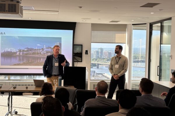Emil Haddad of FVB Energy and Sean Russell of Equans presenting on district energy and the Energy Services Acquisition Program at a Young Leaders in Infrastructure Ottawa event.