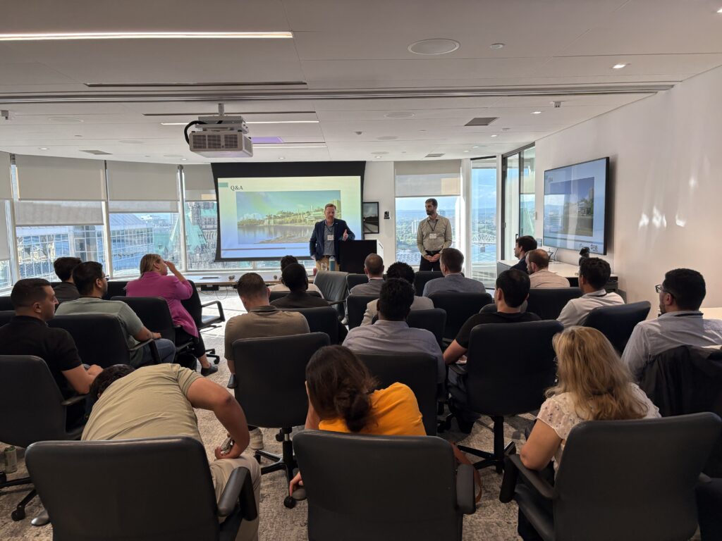 Emil Haddad of FVB Energy and Sean Russell of Equans presenting on district energy and the Energy Services Acquisition Program at a Young Leaders in Infrastructure Ottawa event.