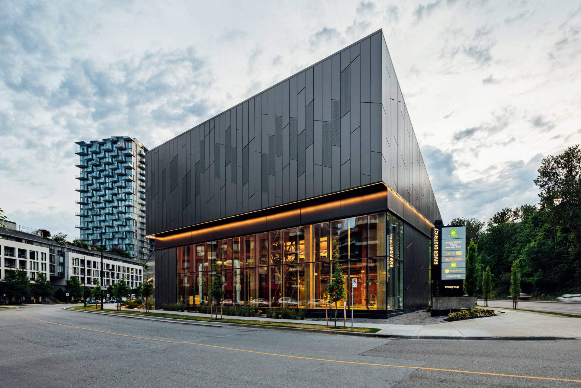 River District energy centre with patterned exterior and visible interior equipment