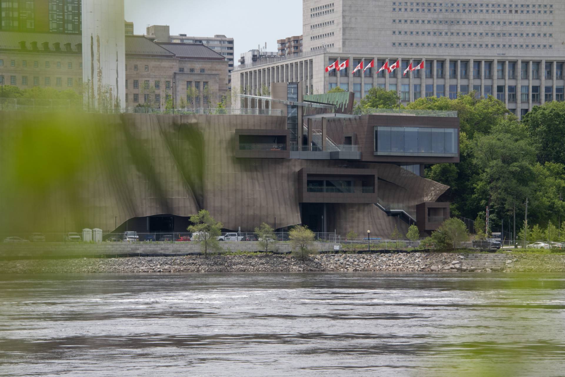 Cliff District Energy Centre building with flowing metal exterior at cliffside