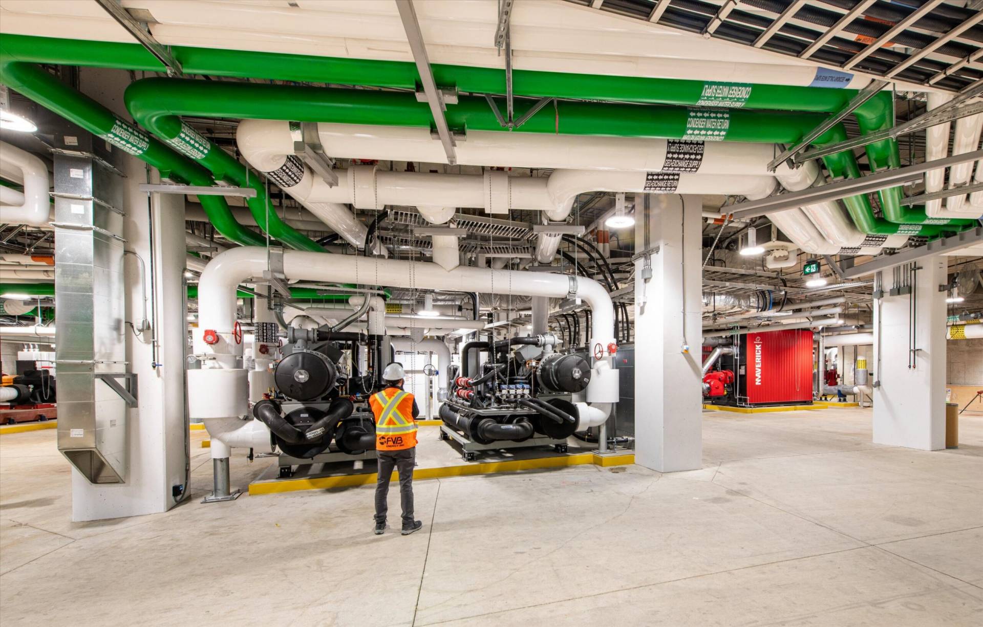 Mechanical plant room with piping and equipment at Oakridge Centre Redevelopment